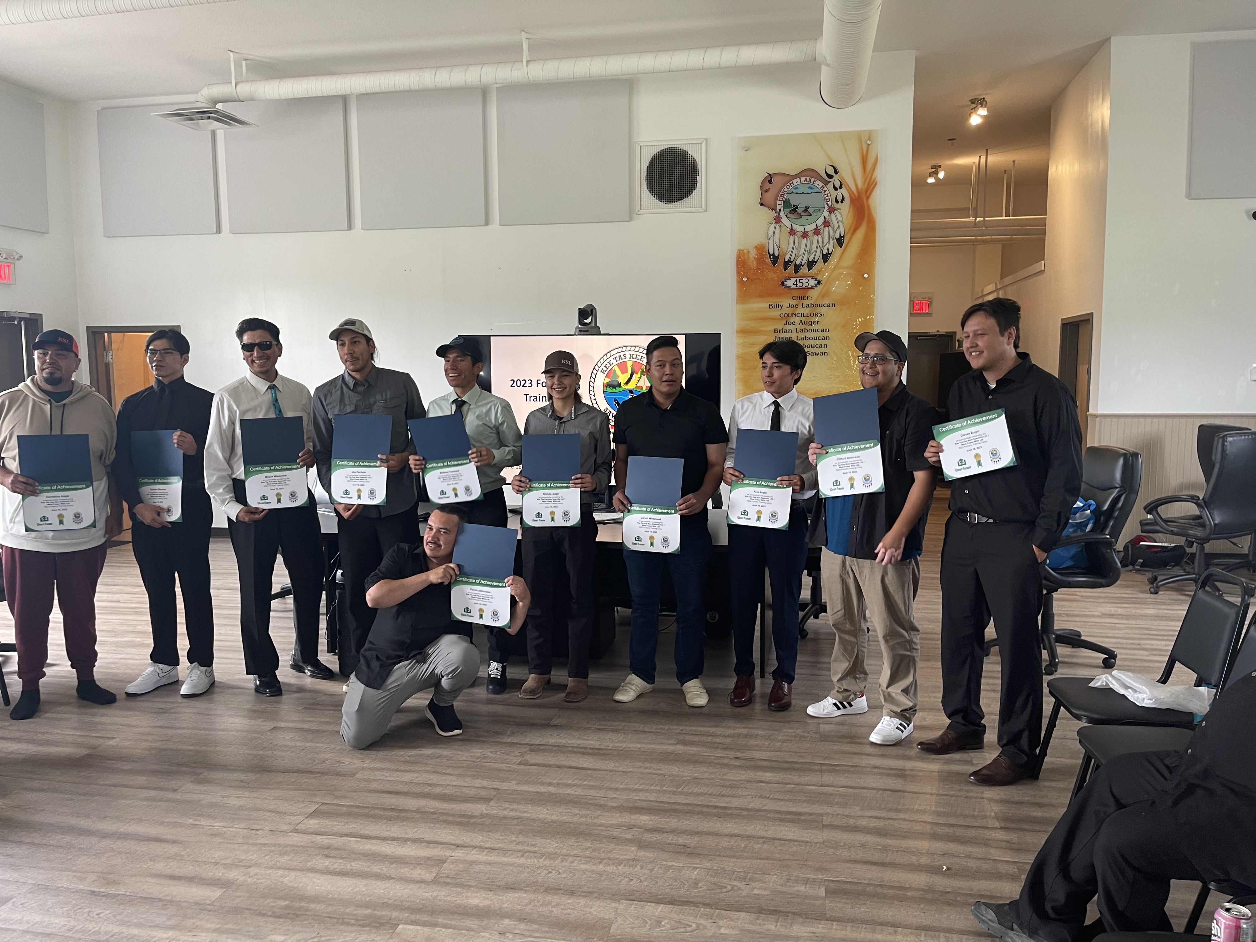 The Indigenous Forestry Training Program Graduating Class of 2023 pose with their certificates.