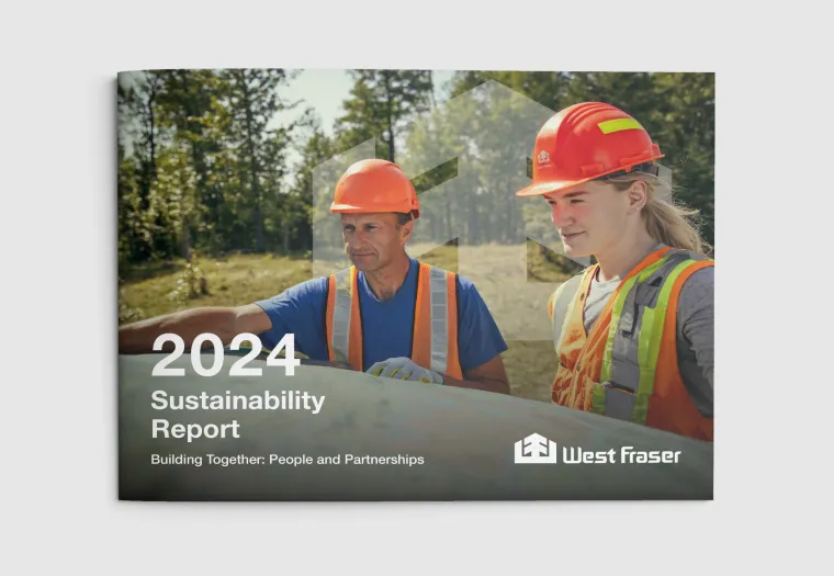 Two construction workers in safety gear stand outdoors on the cover of the 2024 West Fraser Sustainability Report.