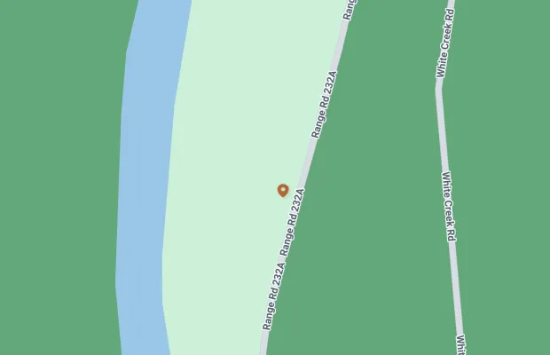 Map displaying Range Road 232A running near a river on the left and intersecting with White Creek Road on the right. A location marker is placed on Range Road 232A near the river.