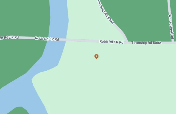 A digital map highlighting the intersection of Robb Road/R Road and Township Road 500A. Nearby roads include Owenship Road 500A and White Creek Road. A river is shown flowing beside Robb Road/R Road.