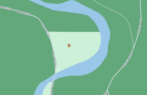 A map showing a road enclosed by a river. The road labeled "Range Rd 322A" forms a loop with another section of the same road. Nearby roads include "Willow Creek Rd" and a river meanders around the area.