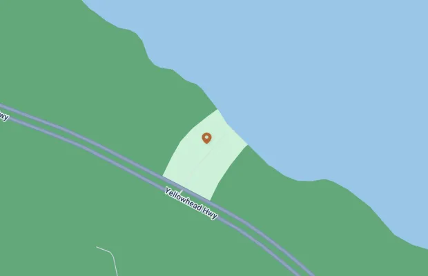 A map view showing Yellowhead Highway running parallel to a body of water. A pin marks a specific location near the shore.