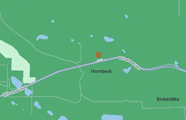 Map showing Hornbeck with a red location pin, featuring nearby roads and green landscape.