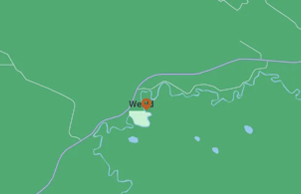 Map highlighting a location marked "We" with surrounding roads and waterways.