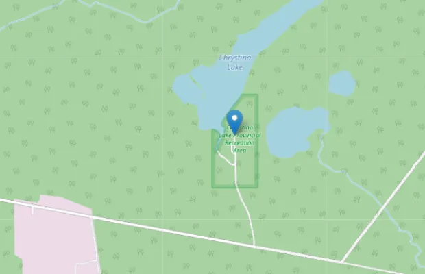 Map showing the location of Chysnino Lake Provincial Recreation Area, marked with a blue pin, surrounded by green forested area and nearby lakes.
