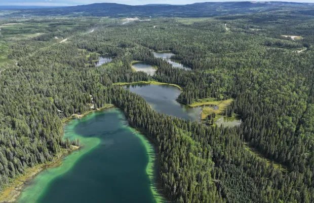 The Emerson Lakes Campground is located at the end of the main lake and is clearly visible in the middle of the photo.