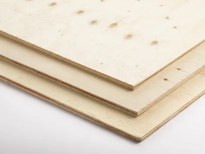 Stack of three sheets of plywood on a white background.